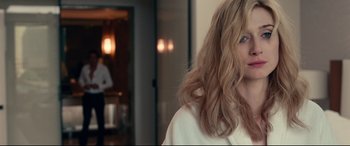 Movie still from “Widows” (2018), directed by Steve McQueen – A person with long blonde hair; Close Up shot, Over the shoulder angle