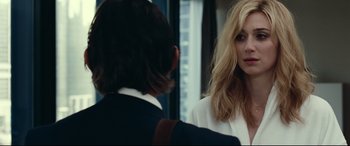 Movie still from “Widows” (2018), directed by Steve McQueen – A woman standing next to a man in front of a window; Close Up shot, Over the shoulder angle