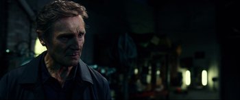 Movie still from “Widows” (2018), directed by Steve McQueen – A person wearing a jacket; Close Up shot, Low angle