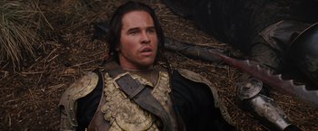 Movie still from “Willow” (1988), directed by Ron Howard – A person wearing a costume; Close Up shot, High angle