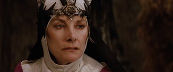 Movie still from “Willow” (1988), directed by Ron Howard – A person wearing a helmet; Close Up shot, High angle