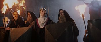 Movie still from “Willow” (1988), directed by Ron Howard – A man and woman dressed in medieval costumes; Medium shot, Low angle