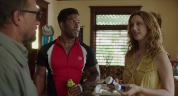 Movie still from “Wilson” (2017), directed by Craig Johnson – A man and a woman standing next to each other in a room; Medium shot, Over the shoulder angle