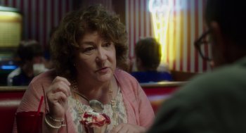 Movie still from “Wilson” (2017), directed by Craig Johnson – A woman sitting at a table eating ice cream; Close Up shot, Over the shoulder angle