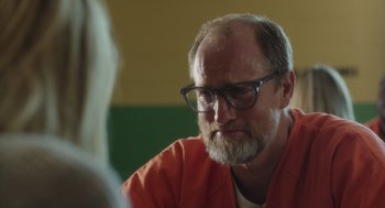 Movie still from “Wilson” (2017), directed by Craig Johnson – An older man wearing glasses and a red shirt; Close Up shot, Over the shoulder angle
