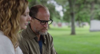 Movie still from “Wilson” (2017), directed by Craig Johnson – An older man and a younger woman sitting in a park; Close Up shot, Over the shoulder angle