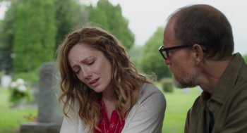 Movie still from “Wilson” (2017), directed by Craig Johnson – A man and a woman sitting next to each other in a park; Close Up shot, Over the shoulder angle