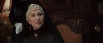 Movie still from “Winchester” (2018), directed by Michael Spierig – An older woman wearing a black dress and a black veil; Close Up shot, Low angle