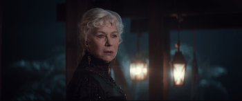 Movie still from “Winchester” (2018), directed by Michael Spierig – An older woman with white hair wearing a black dress; Close Up shot, Low angle