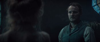 Movie still from “Winchester” (2018), directed by Michael Spierig – A man and a woman are looking at one another; Close Up shot, Over the shoulder angle
