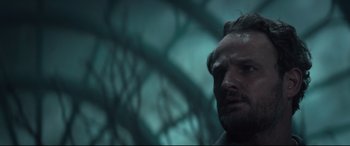 Movie still from “Winchester” (2018), directed by Michael Spierig – A person with a beard; Close Up shot, Low angle