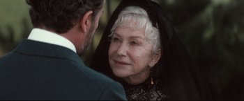 Movie still from “Winchester” (2018), directed by Michael Spierig – An older woman wearing a black dress and a black veil; Close Up shot, Over the shoulder angle