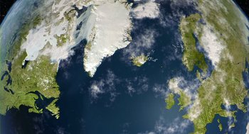 Movie still from “Winged Migration” (2001), directed by Jacques Cluzaud – A satellite image of the ocean and land; Extreme Wide shot, Overhead angle