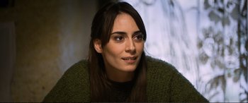 Movie still from “Winter Sleep” (2014), directed by Nuri Bilge Ceylan – A person with long hair; Close Up shot, Over the shoulder angle