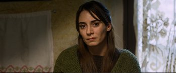 Movie still from “Winter Sleep” (2014), directed by Nuri Bilge Ceylan – A person with long hair; Close Up shot, Over the shoulder angle