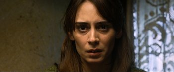 Movie still from “Winter Sleep” (2014), directed by Nuri Bilge Ceylan – A person with long brown hair; Close Up shot, High angle