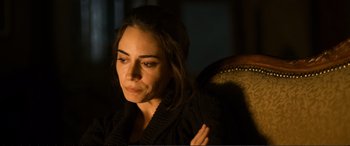 Movie still from “Winter Sleep” (2014), directed by Nuri Bilge Ceylan – A person sitting in a chair; Close Up shot, High angle