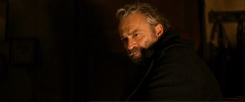 Movie still from “Winter Sleep” (2014), directed by Nuri Bilge Ceylan – A man with a long beard is looking into the distance; Close Up shot, Low angle