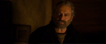 Movie still from “Winter Sleep” (2014), directed by Nuri Bilge Ceylan – A person wearing a jacket; Close Up shot, Over the shoulder angle