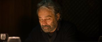 Movie still from “Winter Sleep” (2014), directed by Nuri Bilge Ceylan – An older man with grey hair and a beard; Close Up shot, High angle