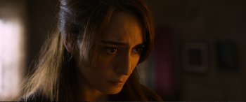 Movie still from “Winter Sleep” (2014), directed by Nuri Bilge Ceylan – A person looking at the camera; Close Up shot, High angle