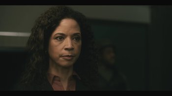 Movie still from “Another Life” (2019), created by Aaron Martin – A person with curly hair; Close Up shot, Over the shoulder angle