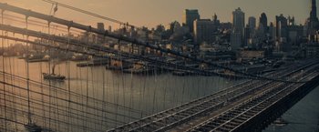 Movie still from “Winter's Tale” (2014), directed by Akiva Goldsman – A view of a city from across the river; Extreme Wide shot, High angle