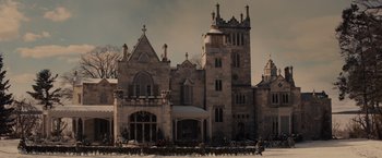Movie still from “Winter's Tale” (2014), directed by Akiva Goldsman – An old building with a very tall tower and many windows; Extreme Wide shot, Low angle