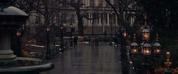 Movie still from “Winter's Tale” (2014), directed by Akiva Goldsman – A couple of people are walking in the rain; Extreme Wide shot, High angle