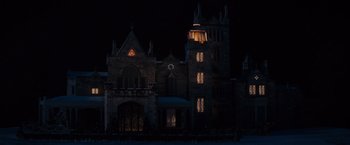 Movie still from “Winter's Tale” (2014), directed by Akiva Goldsman – A building that is lit up at night time; Extreme Wide shot, Low angle