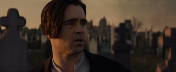 Movie still from “Winter's Tale” (2014), directed by Akiva Goldsman – A person wearing a suit and tie; Close Up shot, Over the shoulder angle