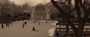 Movie still from “Winter's Tale” (2014), directed by Akiva Goldsman – A group of people walking on a sidewalk; Extreme Wide shot, High angle
