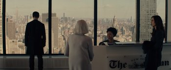 Movie still from “Winter's Tale” (2014), directed by Akiva Goldsman – Two women in front of a window with a view of a city; Medium shot, Over the shoulder angle