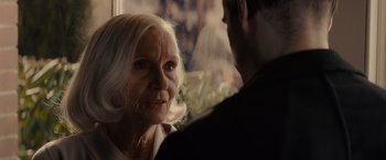 Movie still from “Winter's Tale” (2014), directed by Akiva Goldsman – An older woman and a younger man looking at each other; Close Up shot, Over the shoulder angle