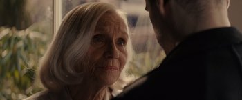 Movie still from “Winter's Tale” (2014), directed by Akiva Goldsman – An older woman looking at a younger man; Close Up shot, Over the shoulder angle