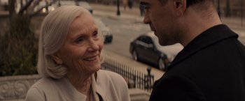 Movie still from “Winter's Tale” (2014), directed by Akiva Goldsman – An older woman and a younger man talking on a sidewalk; Close Up shot, Over the shoulder angle