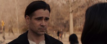 Movie still from “Winter's Tale” (2014), directed by Akiva Goldsman – A person wearing a suit and tie; Close Up shot, Over the shoulder angle