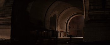 Movie still from “Winter's Tale” (2014), directed by Akiva Goldsman – A dark room with arches and lights on the ceiling; Extreme Wide shot, High angle