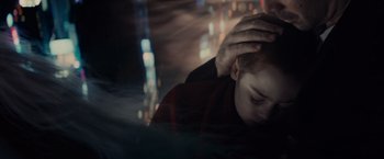 Movie still from “Winter's Tale” (2014), directed by Akiva Goldsman – A person with their head in their hands; Close Up shot, Over the shoulder angle