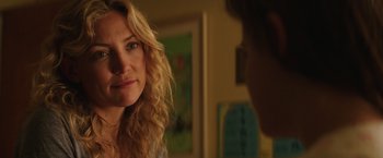 Movie still from “Wish I Was Here” (2014), directed by Zach Braff – A person looking at another person; Close Up shot, Over the shoulder angle