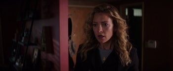 Movie still from “Wish I Was Here” (2014), directed by Zach Braff – A person wearing a suit jacket; Close Up shot, Over the shoulder angle