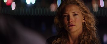 Movie still from “Wish I Was Here” (2014), directed by Zach Braff – A person with curly blonde hair; Close Up shot, Over the shoulder angle