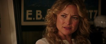 Movie still from “Wish I Was Here” (2014), directed by Zach Braff – A person with curly blonde hair; Close Up shot, Over the shoulder angle