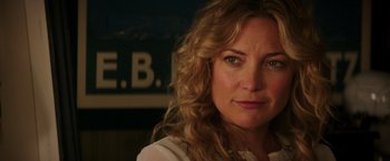 Movie still from “Wish I Was Here” (2014), directed by Zach Braff – A person with curly hair; Close Up shot, Over the shoulder angle