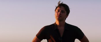 Movie still from “Wish I Was Here” (2014), directed by Zach Braff – A person wearing a brown shirt; Close Up shot, Low angle