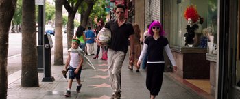 Movie still from “Wish I Was Here” (2014), directed by Zach Braff – A group of people walking down a street; Wide shot, Low angle