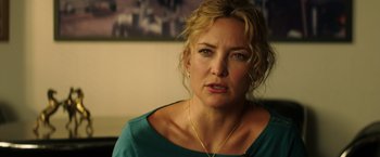 Movie still from “Wish I Was Here” (2014), directed by Zach Braff – A person wearing a blue shirt; Close Up shot, Over the shoulder angle