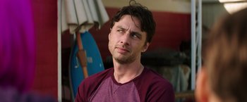Movie still from “Wish I Was Here” (2014), directed by Zach Braff – A person wearing a purple shirt; Close Up shot, Over the shoulder angle
