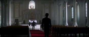 Movie still from “Wish I Was Here” (2014), directed by Zach Braff – A group of men standing in front of an altar; Extreme Wide shot, Low angle