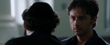 Movie still from “Wish I Was Here” (2014), directed by Zach Braff – A man and a woman are talking to each other; Close Up shot, Over the shoulder angle